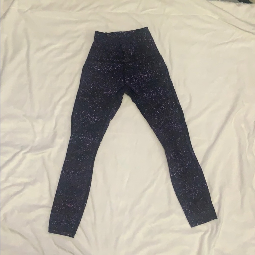 Black and purple dotted leggings